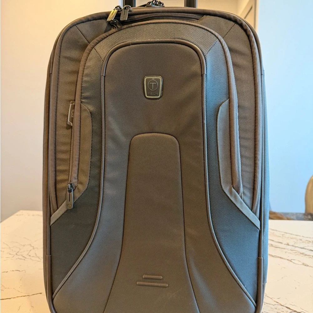Tumi Brown Backpack with Multiple Compartments